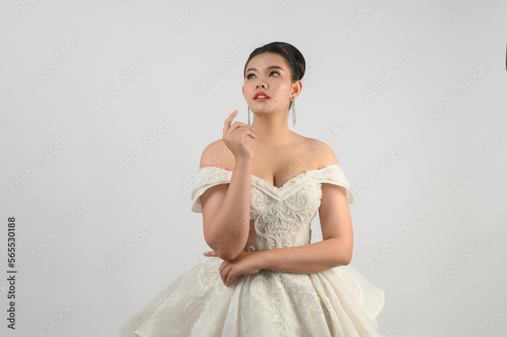 Young asian beautiful bride smile with happy on white background Young asian beautiful bride smile with happy on white background