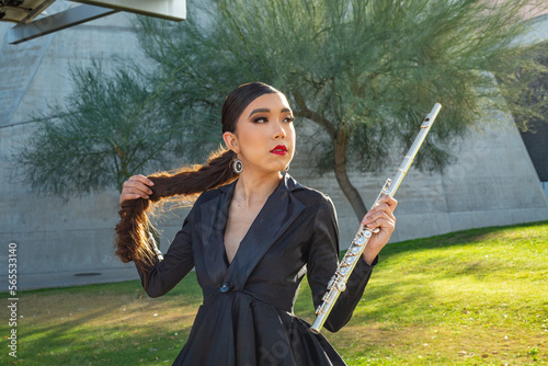 flute flutist model arizona phoenix science center model performance concert musician beautiful glame player music red lipstick black dress urban city event concerts photo