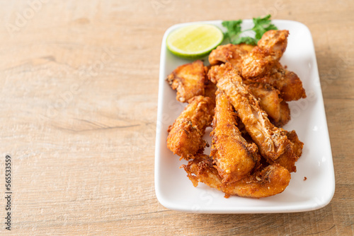 Fried Snapper Belly on white plate