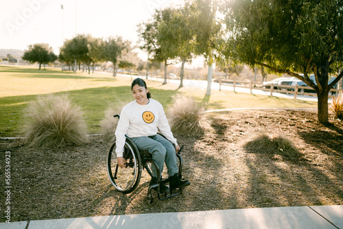 person riding a wheelchair at park