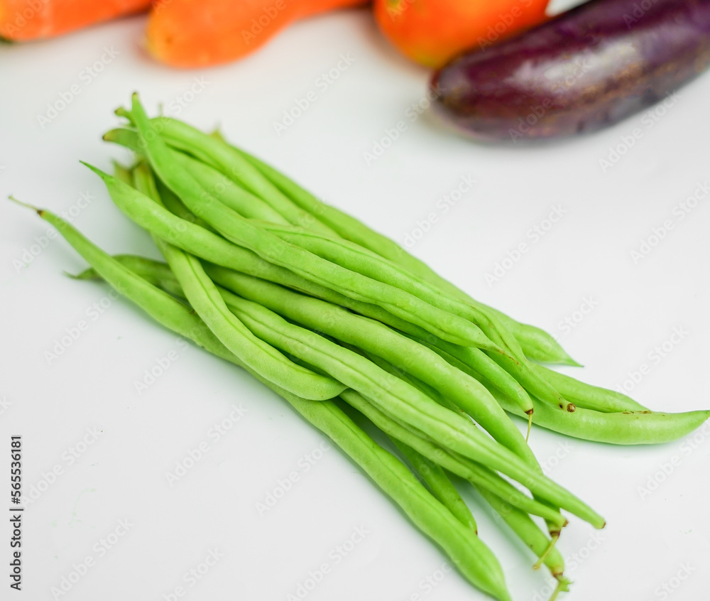 Long beans vegetables on a white background. Vegetables on a white background. Long beans vegetables on a white background. Vegetables on a white background.