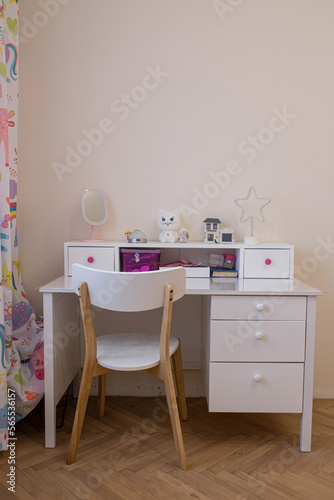 Interior of a children's room for a girl. Desk