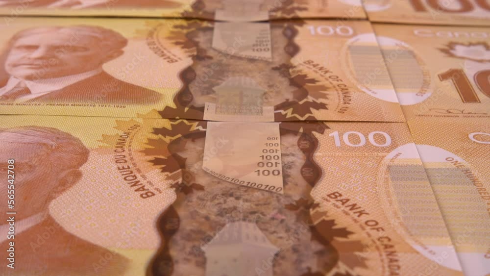 Canadian 100 dollar polymer banknotes with a portrait of Robert Borden. Canadian 100 dollar polymer banknotes with a portrait of Robert Borden.