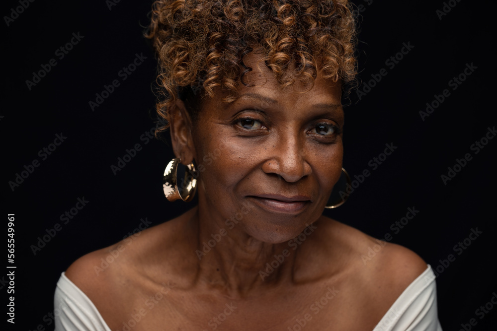 Beautiful elderly African American senior citizen widow looking at camera with neutral serious expression Beautiful elderly African American senior citizen widow looking at camera with neutral serious expression
