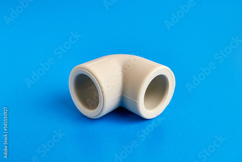 The connection angle of the thermoplastic pipe at an angle of 90 degrees. Concept of installation of water supply and sewage systems.