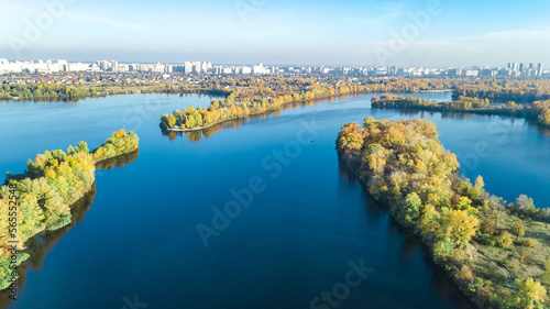 Kyiv cityscape, Dnieper and Desenka rivers landscape aerial drone view, autumn islands and water from above, Kiev city skyline and nature parks in spring, Ukraine
 photo