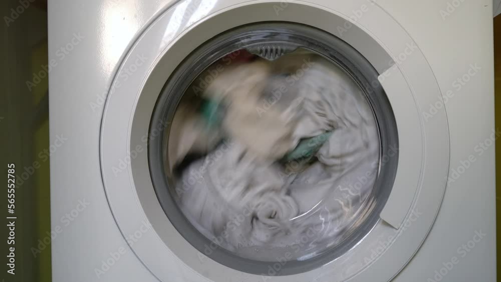 Modern washing machine, Clothes washing machine in laundry, Laundry being done at home. Modern washing machine, Clothes washing machine in laundry, Laundry being done at home.