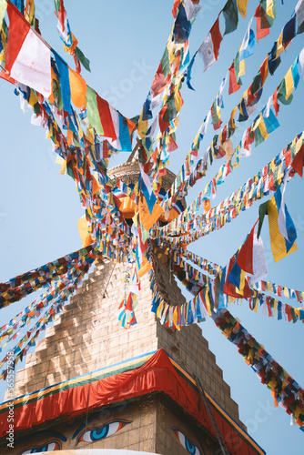 Swayambhunath temple in Kathmandu, Nepal with colofrul flags photo