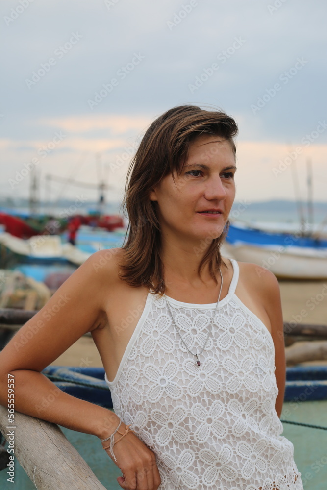 Attractive woman at the beach in Sri Lanka.