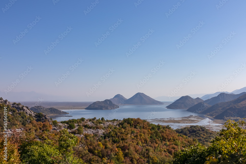 Obraz premium Panoramic view of Lake Skadar National Park in autumn near tourist village Virpazar, Bar, Montenegro, Balkans, Europe. Travel destination in Dinaric Alps near Albania. Stunning landscape and nature