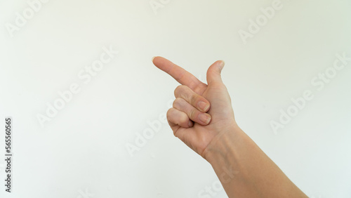 The index finger of the right hand, shows the direction