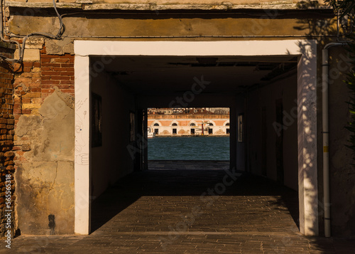 architectural detail of a passageway leading to the canal in Venice, Italy