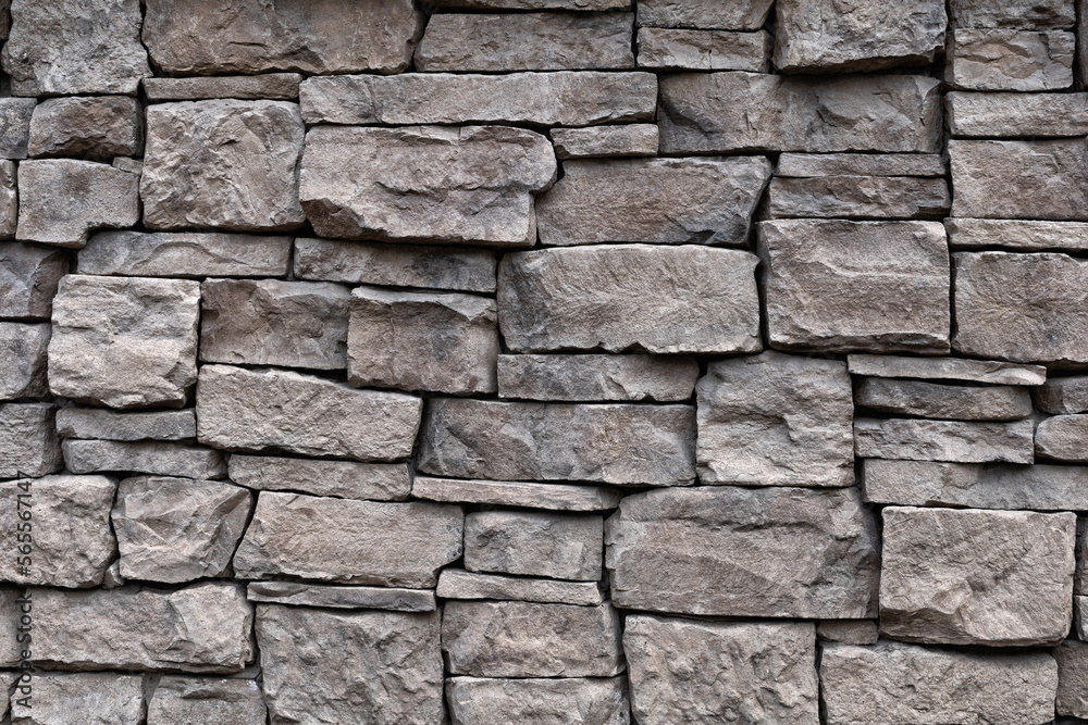 Natural stone wall texture. Rough rock masonry abstract background