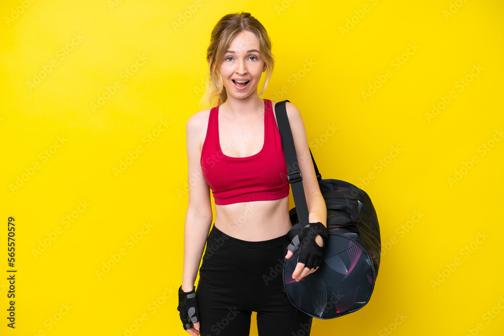 Young sport caucasian woman with sport bag isolated background with surprise facial expression Young sport caucasian woman with sport bag isolated background with surprise facial expression