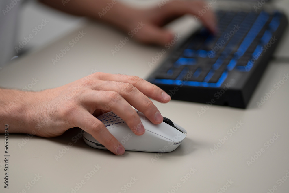 office worker using a new white computer mouse office worker using a new white computer mouse