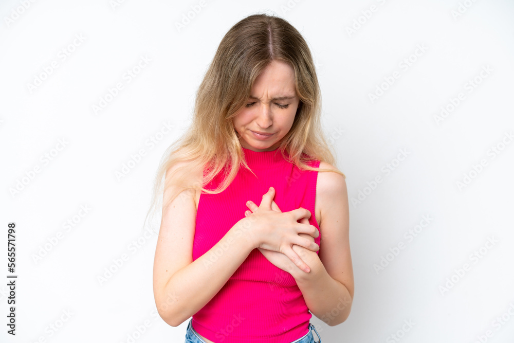 Blonde English young girl isolated on white background having a pain in the heart Blonde English young girl isolated on white background having a pain in the heart