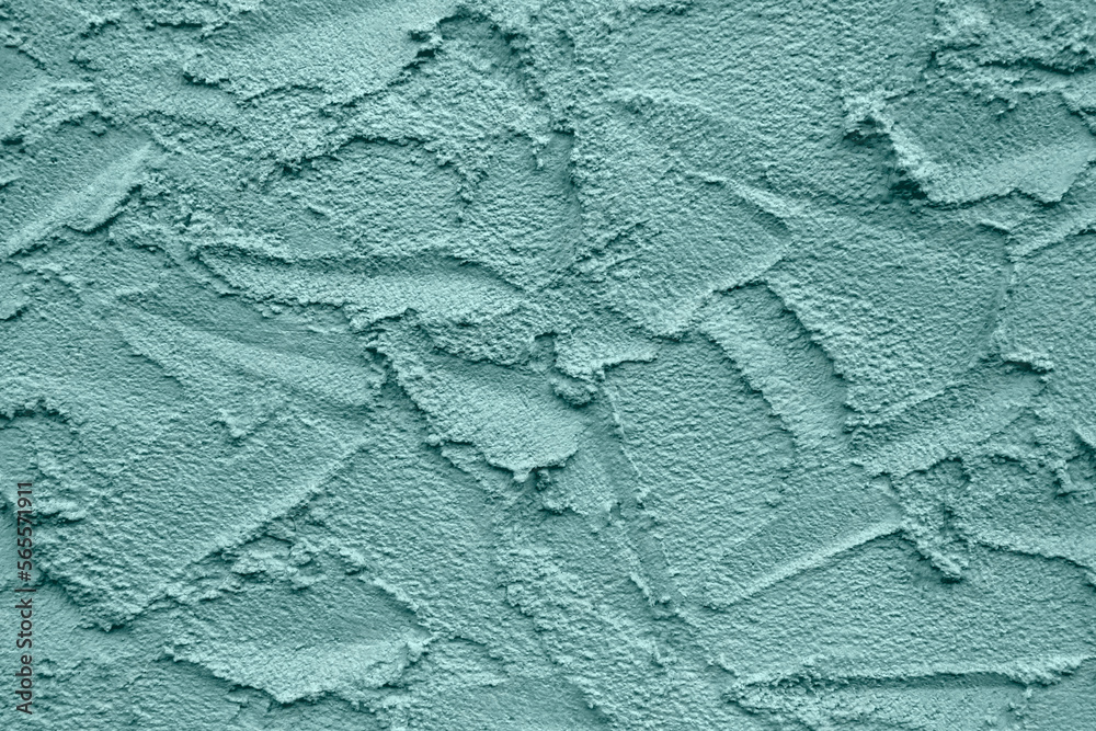 Abstract drawing on plastered wall. Toned in color Tidewater Green, background, texture. Copy space. Selective focus. Abstract drawing on plastered wall. Toned in color Tidewater Green, background, texture. Copy space. Selective focus.