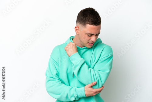 Young brazilian man isolated on white background with pain in elbow © luismolinero
