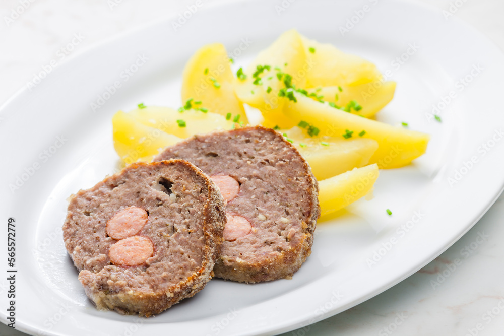 homemade meat loaf filled with sausage