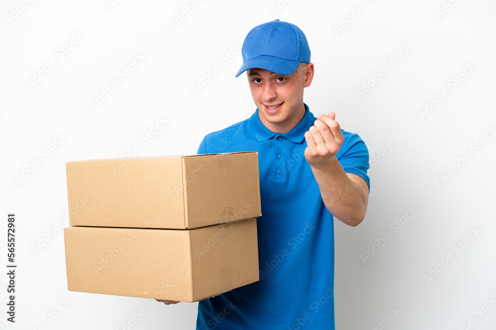 Young delivery Brazilian man isolated ops white background making money gesture Young delivery Brazilian man isolated ops white background making money gesture