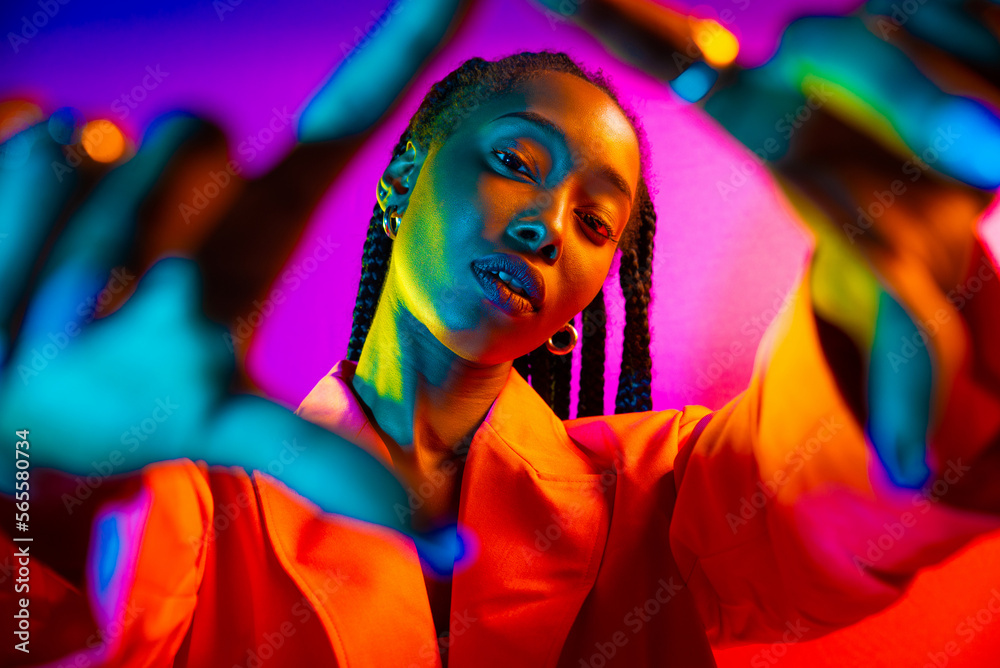 Naklejka premium Beautiful african american woman with afro pigtails hairstyle and stylish clothes - Portrait of young black girl in studio, creative portrait with fashionable style in studio