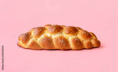 Photography Braided bread isolated on a pink background