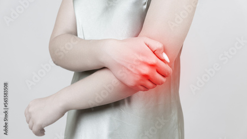 Wallpaper Mural young woman experiencing pain in elbow joint Torontodigital.ca