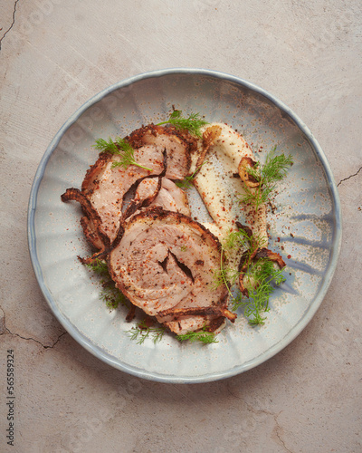 Roasted pork belly roll with fennel crust