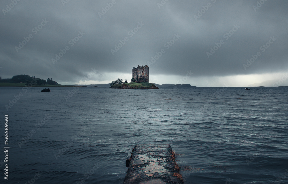 Views of Castle Stalker under storm clouds