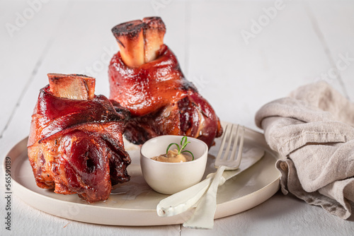 Photography Delicious ham hock baked in casserole with spices.