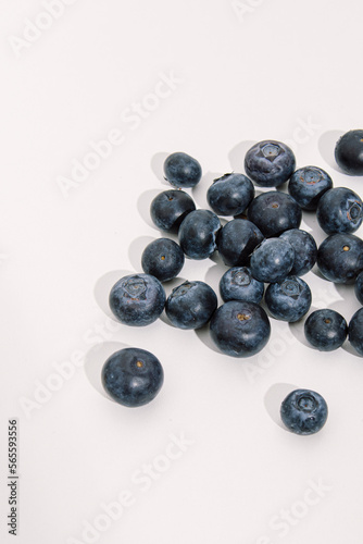 Blueberries on white background. Vertical