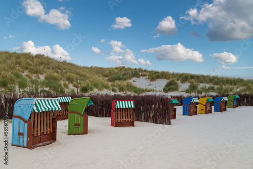 Beach chairs on the beach of island Heligoland. North sea. Germany. photo