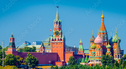Spasskaya Tower of Moscow Kremlin and Cathedral of Vasily the Blessed (Saint Basil's Cathedral) on Red Square in summer day. Panoramic view. Moscow. Russia