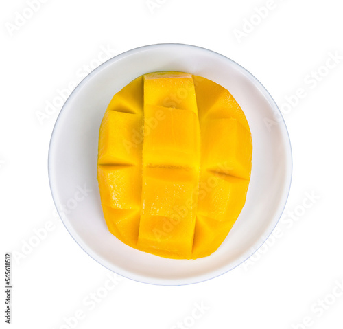 Ripe mango sliced diced. Top view of sliced fresh mango in white plate Isolated on PNG transparent background