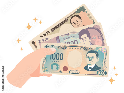 きらきらした新千円・五千円・一万円札を持つ手