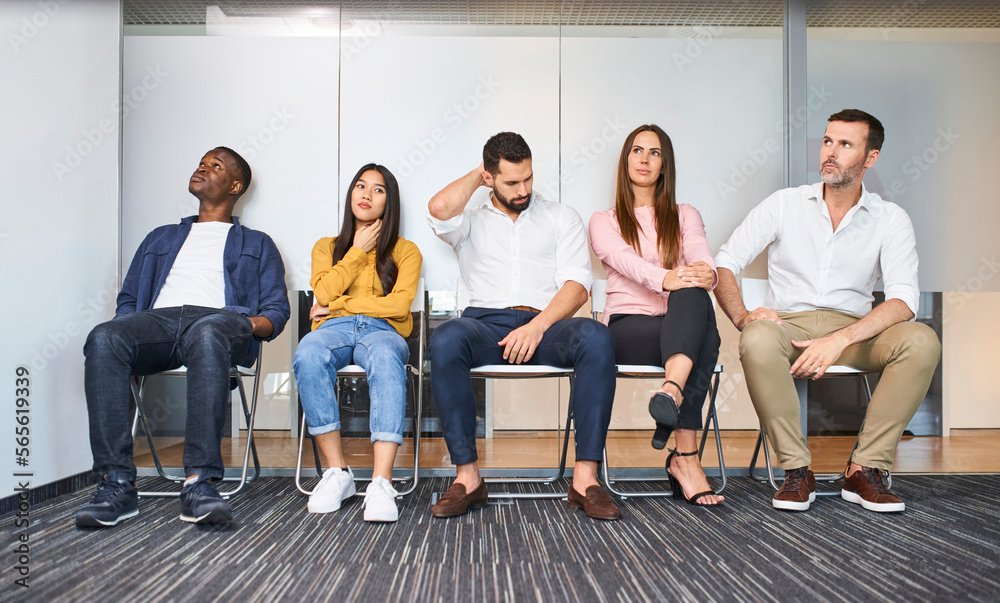 Fototapeta premium Group of stressed diverse people waiting for job interview
