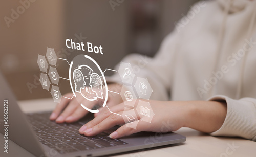 Woman using computer chatting with an intelligent artificial intelligence asks for the answers wants. knowledge on the internet, e-learning, ChatGPT Chat with AI or Artificial Intelligence technology. photo