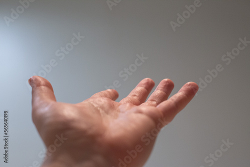 hand with open palm showing skin texture minimalist isolated