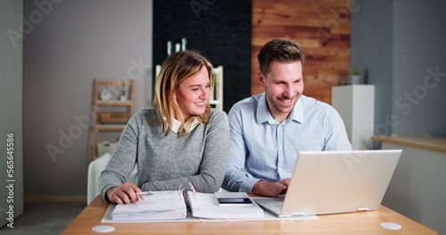 Couple Doing Taxes And Family Budget