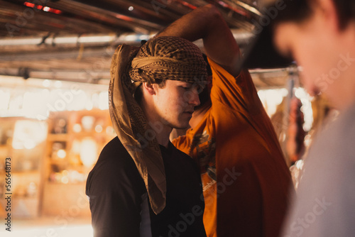 Valokuva man in a bedouin tent