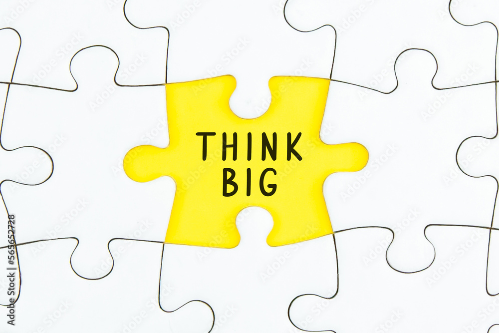 Think big Motivational quotes inscription on a Jigsaw Puzzle Think big Motivational quotes inscription on a Jigsaw Puzzle