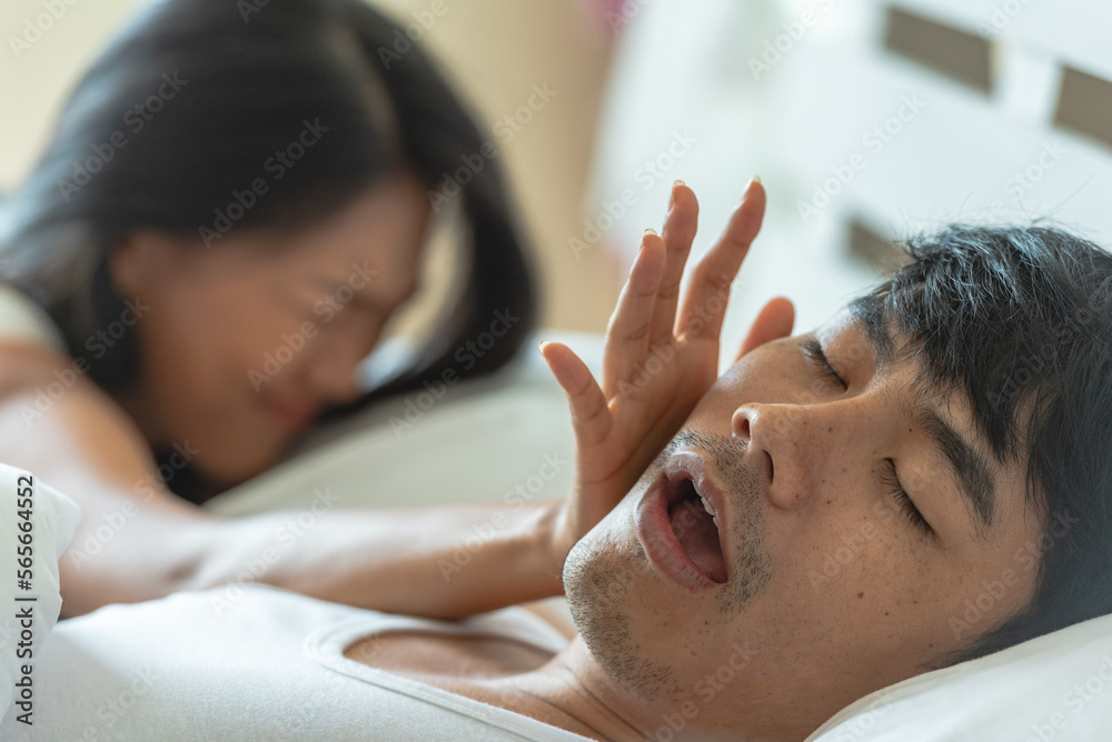 Husband snoring in bedtime. wife suffer unhappy and not sleeping because noise from snoring Husband snoring in bedtime. wife suffer unhappy and not sleeping because noise from snoring