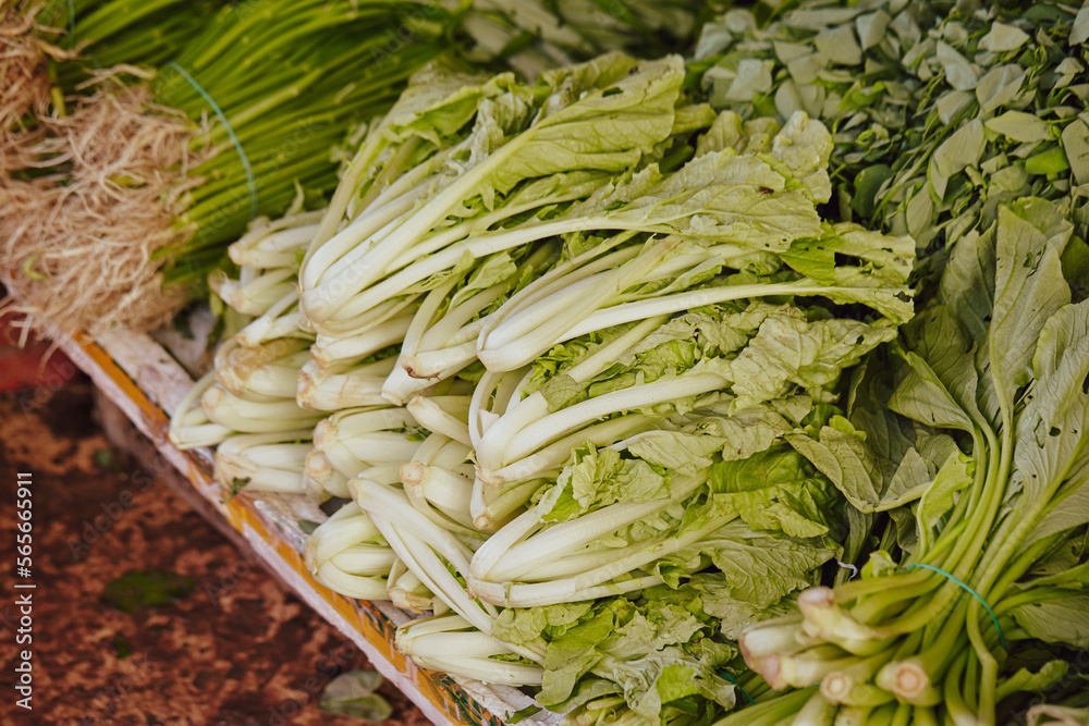 Fresh vegetables on display in a traditional market