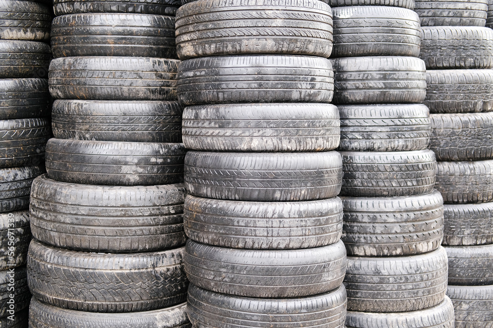 stack of old tires, a stack of tires stack of old tires, a stack of tires