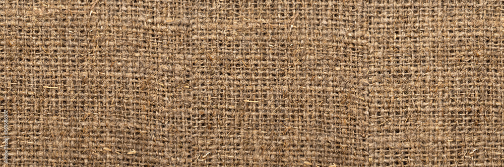 Textile. Burlap texture close up. Packing material. hessian burlap sacking background. Luxury background with empty space for design. Top view web banner Textile. Burlap texture close up. Packing material. hessian burlap sacking background. Luxury background with empty space for design. Top view web banner