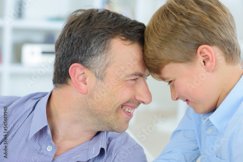 a father and son at home