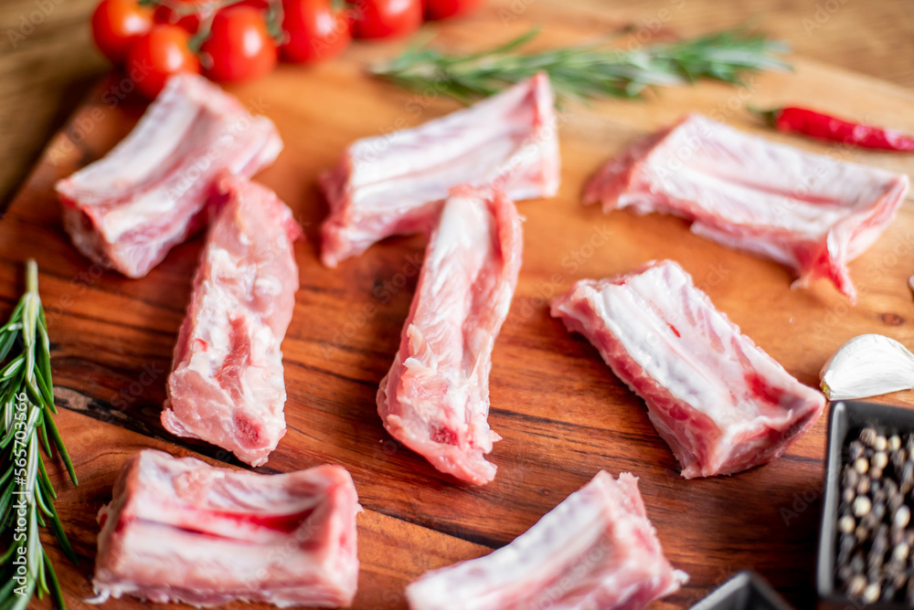 raw pork ribs on wooden background