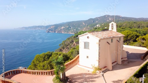 Photography Ermita de Sant Elm chapel on a hill at Sant Feliu de Guíxols overlooking along t