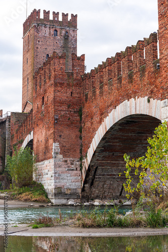 Panoramic view of Castelvecchio Bridge in Verona, Italy showcasing its historic arch bridge design and scenic surroundings
