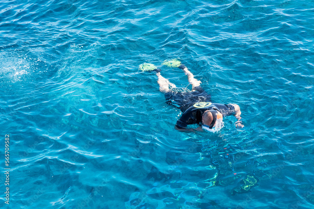 Egypt - man snorkeling with mask in Red sea